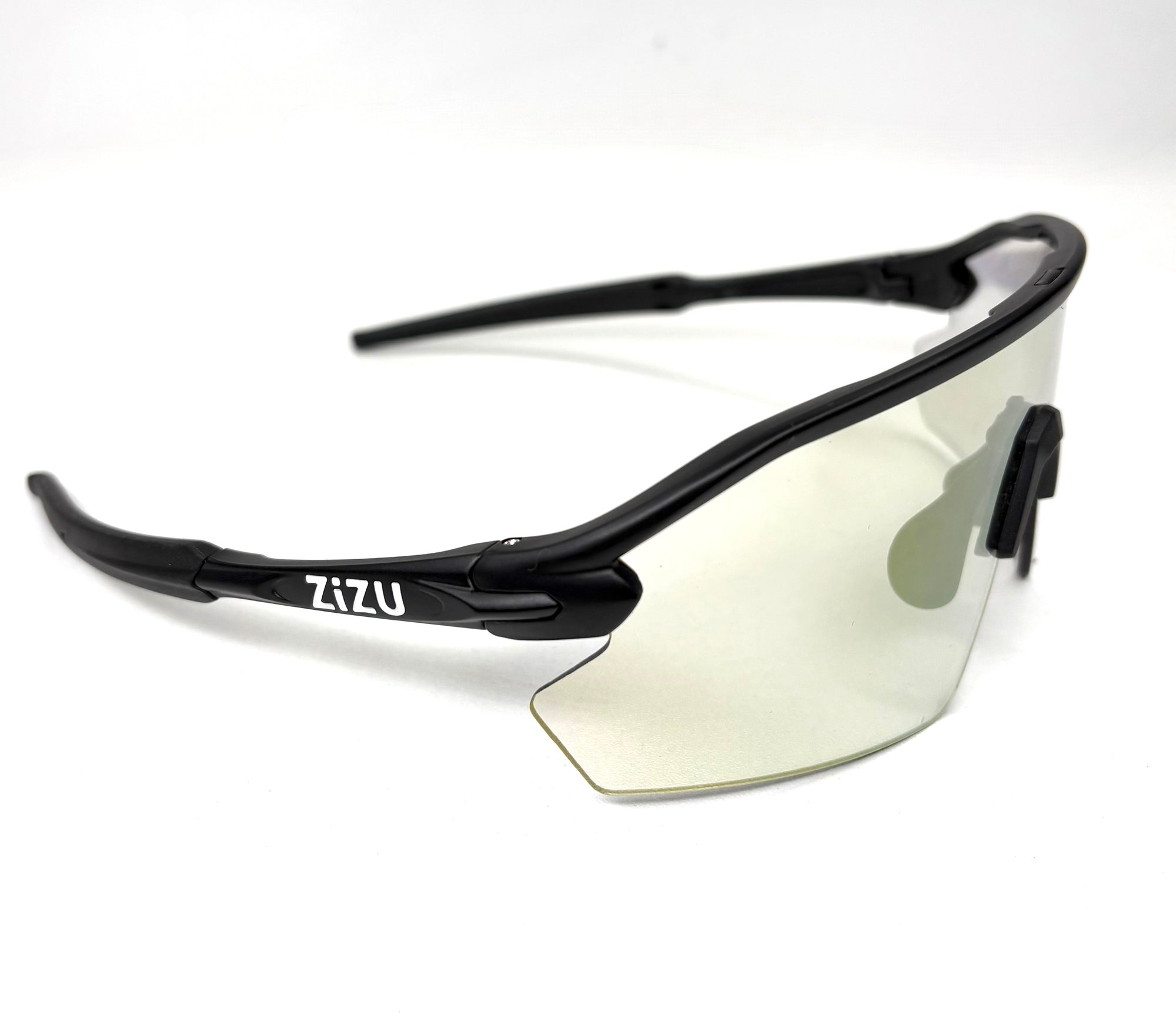 Sunglasses with black frame and reflective lens on a white background, featuring the brand 'ZIZU'.