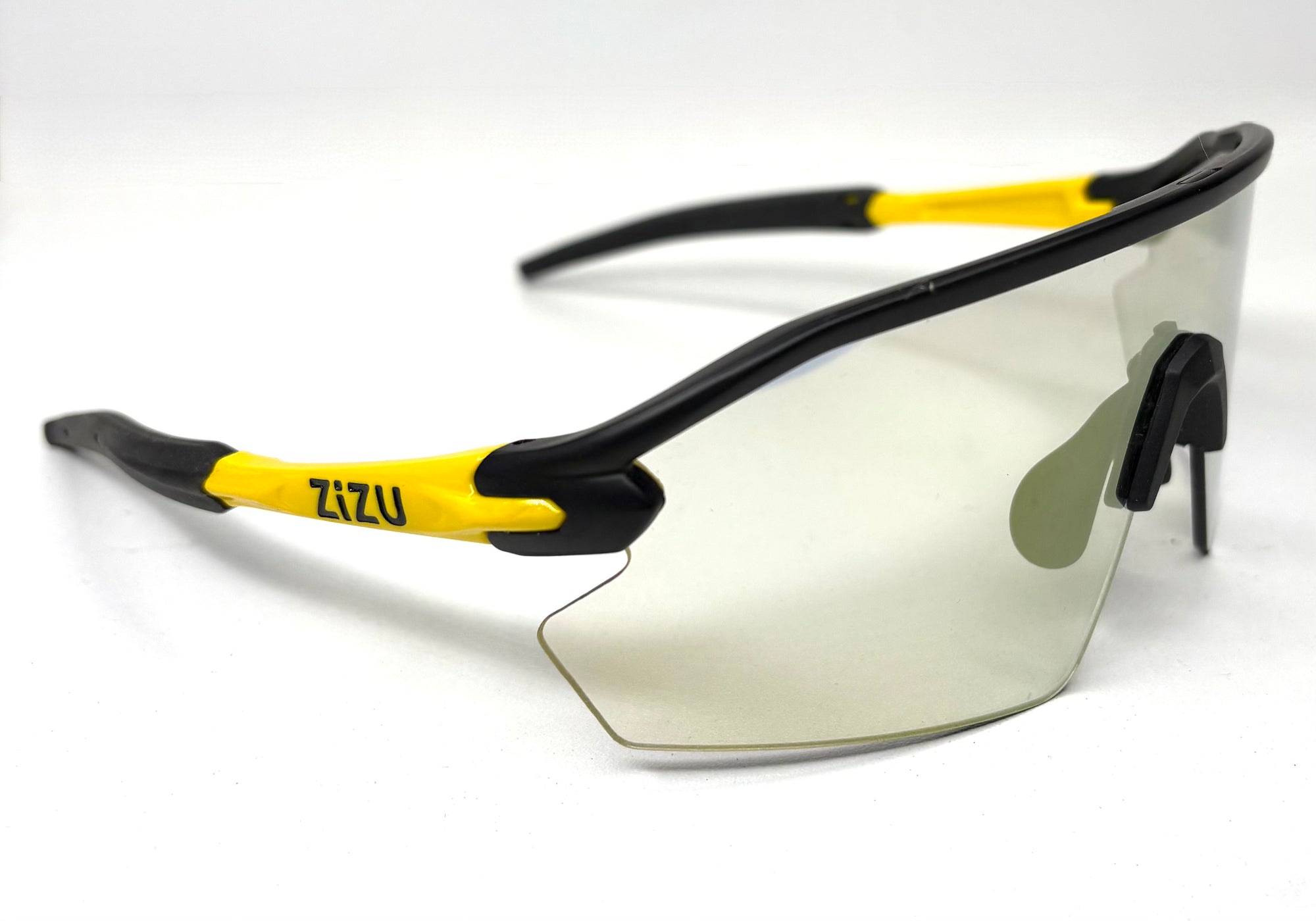 Sunglasses with black and yellow frame on a white background